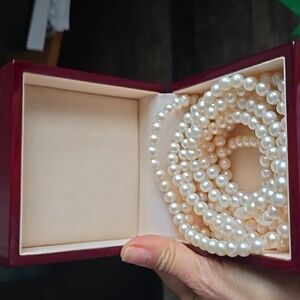 Long Strand Of Pearls